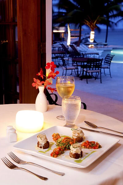 Central America, Belize, Ambergris Caye, San Pedro, candlelit dinner by chef Jose
