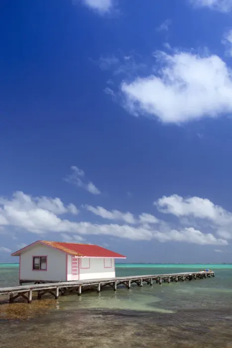Framed Print : Central America, Belize, Ambergris Caye, San Pedro, a red hut on a jetty contrasted Framed Print : Central America, Belize, Ambergris Caye, San Pedro, a red hut on a jetty contrasted