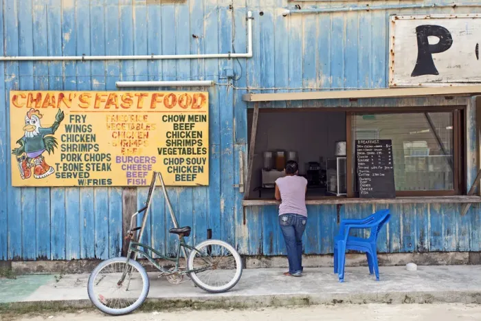 Framed Print : Central America, Belize, Belize district, Caye Caulker, Chans fast food and breakfast