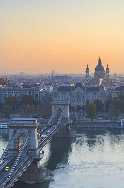 Chain Bridge (Szechenyi Bridge) and St Stephens Basilica at sunrise, Budapest, Hungary