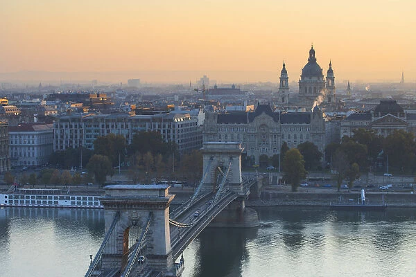 Chain Bridge (Szechenyi Bridge) and St Stephens Basilica at sunrise, Budapest, Hungary