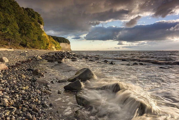 Chalk cliffs at the Baltic Sea in the dramatic morning light, National Park Jasmund, Island Rugen, Mecklenburg-Western Pomerania, Germany, Europe