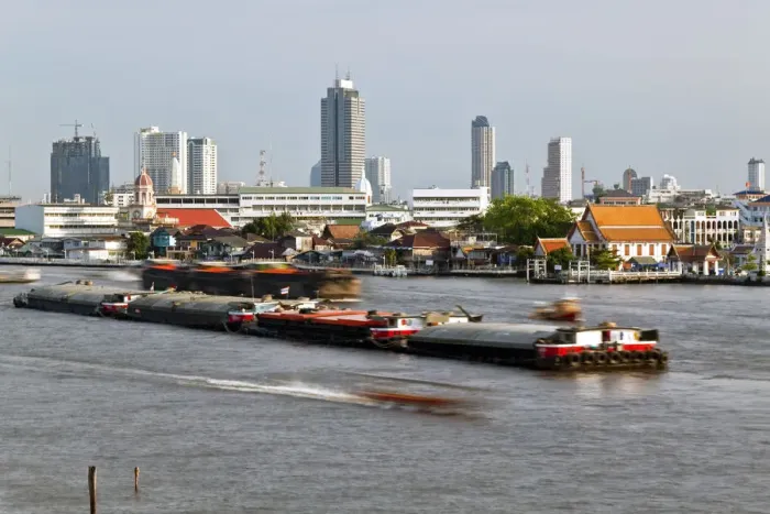 Framed Print : Chao Phraya river and the modern Bangkok skyline, Bangrak district, Bangkok, Thailand