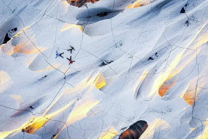 Framed Print : Cheerful hikers lying down on pomice stones, Campo de Piedra Pomez, El Penon, Catamarca, Argentina. (MR)