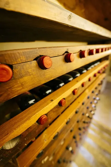 Framed Print : Chianti wine bottles in cellar, Tuscany, Italy