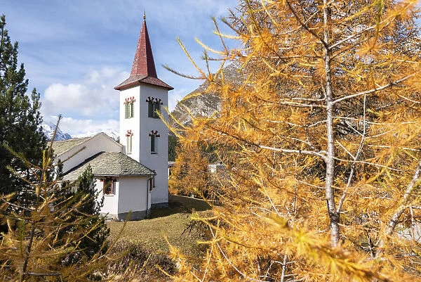 Chiesa Bianca of Maloja in autumn, Maloja, Bregaglia Valley, Canton of Graubunden, Engadin, Switzerland