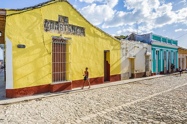A child walking in a street in Trinidad, Sancti Spiritus, Cuba