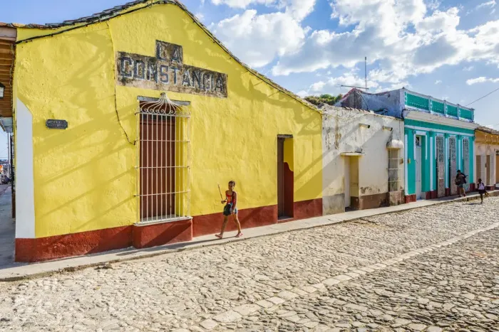 Framed Print : A child walking in a street in Trinidad, Sancti Spiritus, Cuba Framed Print : A child walking in a street in Trinidad, Sancti Spiritus, Cuba