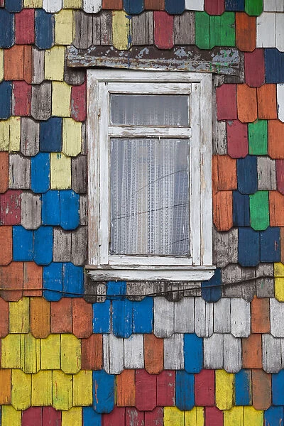 Chile, Chiloe Island, Ancud, colorful house exterior