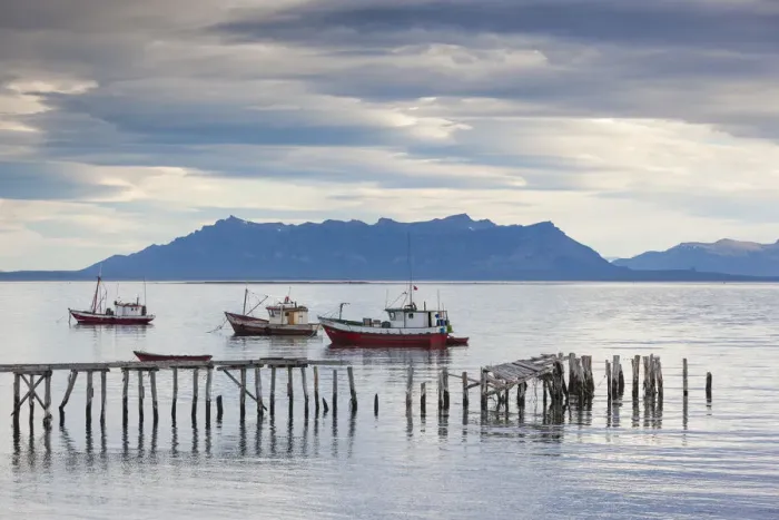 Framed Print : Chile, Magallanes Region, Puerto Natales, fishing boats, Seno Ultima Esperanza bay Framed Print : Chile, Magallanes Region, Puerto Natales, fishing boats, Seno Ultima Esperanza bay