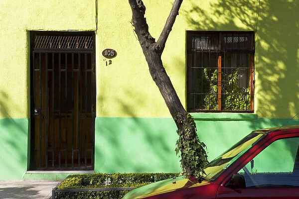 Chile, Santiago, colourfully painted housefronts in the trendy district of Barrio