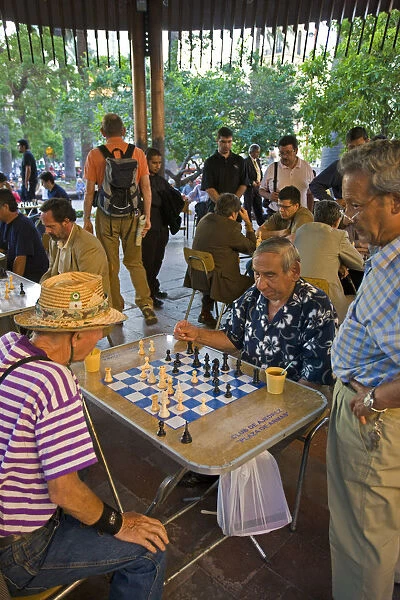 Chile, Santiago, men playing Chess in Plaza de Armas