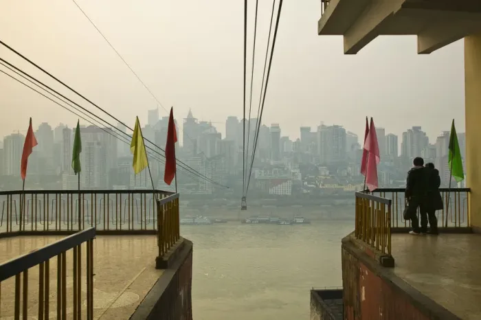 Framed Print : China, Chongqing Province, Yangtze River, Chongqing, Passengers waiting for Cable Car Framed Print : China, Chongqing Province, Yangtze River, Chongqing, Passengers waiting for Cable Car