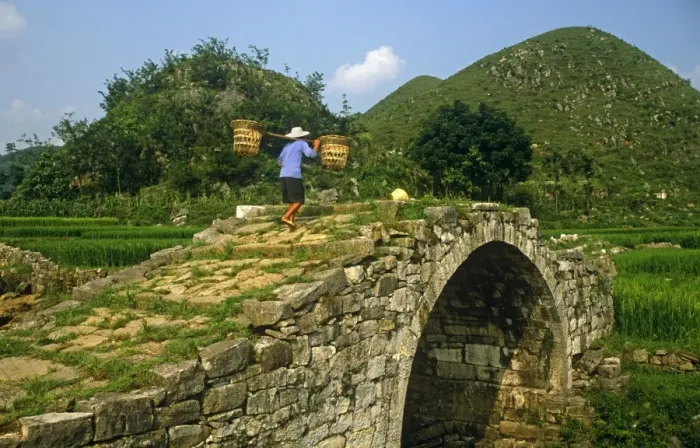Framed Print : China, Guizhou Province, nr. Huangguoshu Falls. Stone-built humpbacked bridges are common in Bouyi Framed Print : China, Guizhou Province, nr. Huangguoshu Falls. Stone-built humpbacked bridges are common in Bouyi