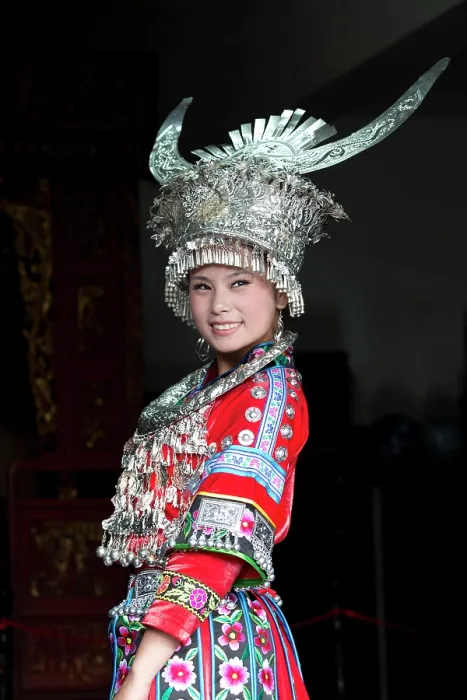 Framed Print : China, Guizhou, a woman wears a traditional Miao costume Framed Print : China, Guizhou, a woman wears a traditional Miao costume