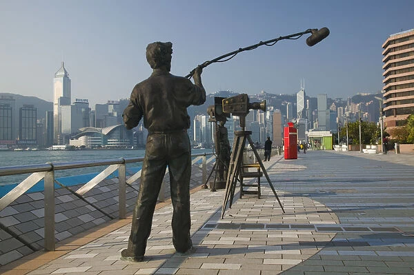 China, Hong Kong, Kowloon, Avenue of the Stars by Victoria Harbour, statue of TV interview
