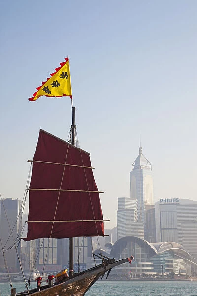 China, Hong Kong, Kowloon, Victoria Harbour, Junk Boat Sail and City Skyline in Background