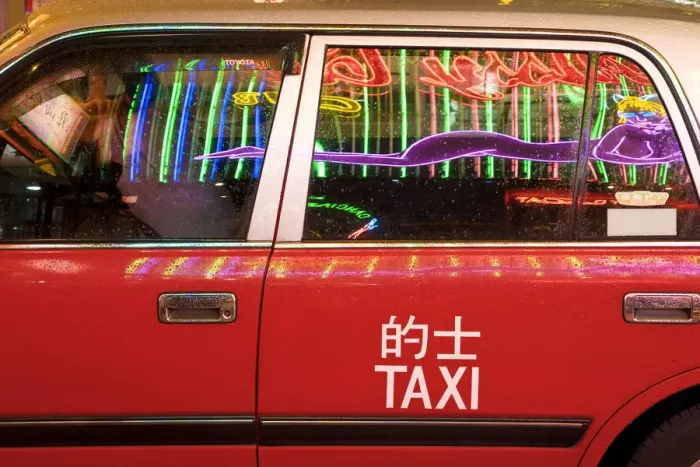 Framed Print : China, Hong Kong, Wan Chai, nightlife neon reflected in a Hong Kong taxi window