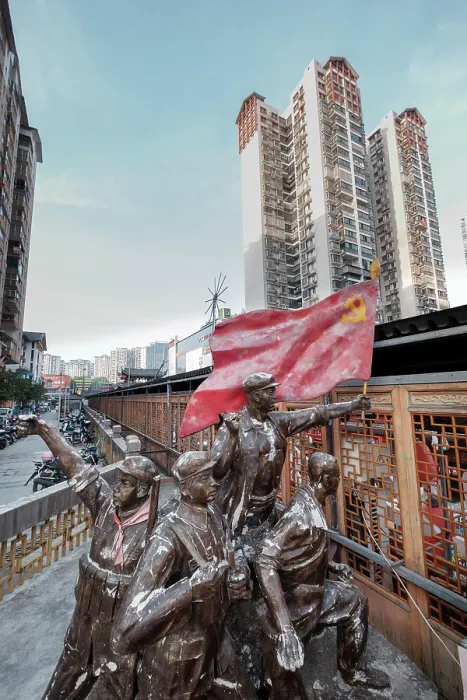 Framed Print : China, Hunan Province, Zhangjiajie, Zhangjiajie City, Statue of communist workers holding the national flag Framed Print : China, Hunan Province, Zhangjiajie, Zhangjiajie City, Statue of communist workers holding the national flag