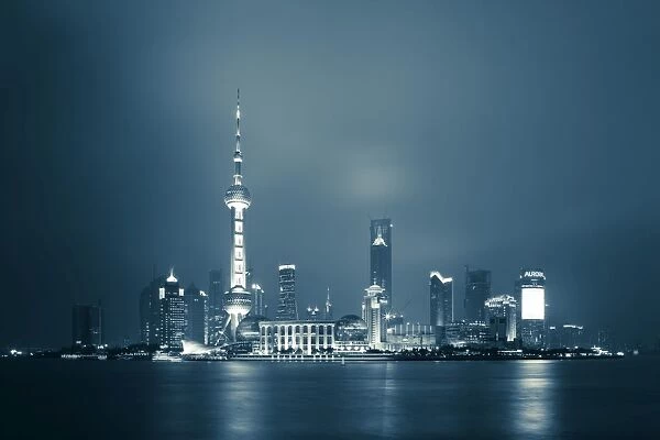 China, Shanghai, Pudong skyline across Huangpu River