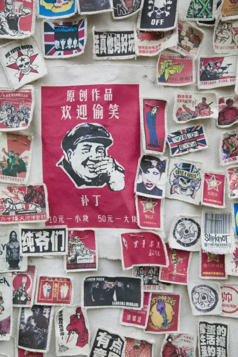 Framed Print : China, Yunnan Province, Dali, Old Town, Chinese clothing patches sold at the foreigner Framed Print : China, Yunnan Province, Dali, Old Town, Chinese clothing patches sold at the foreigner