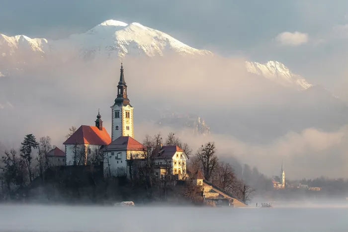 Framed Print : Church of the Assumption of the Blessed Virgin Mary, on Bled island, Lake Bled, in winter, with the Julian Alps in the distance, Bled, Slovenia Framed Print : Church of the Assumption of the Blessed Virgin Mary, on Bled island, Lake Bled, in winter, with the Julian Alps in the distance, Bled, Slovenia