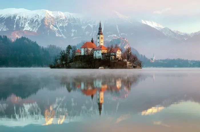 Framed Print : Church of the Assumption of the Blessed Virgin Mary, on Bled island, Lake Bled, in winter, with the Julian Alps in the distance, Bled, Slovenia Framed Print : Church of the Assumption of the Blessed Virgin Mary, on Bled island, Lake Bled, in winter, with the Julian Alps in the distance, Bled, Slovenia