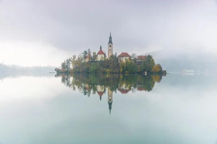 Framed Print : Church of the Assumption of the Blessed Virgin Mary, on Bled island, in misty weather, Lake Bled, Bled, Slovenia Framed Print : Church of the Assumption of the Blessed Virgin Mary, on Bled island, in misty weather, Lake Bled, Bled, Slovenia