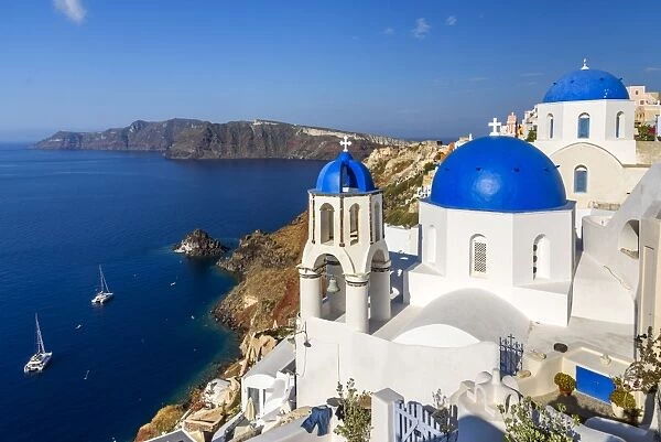 Church with blue domes in Oia, Santorini, South Aegean, Greece
