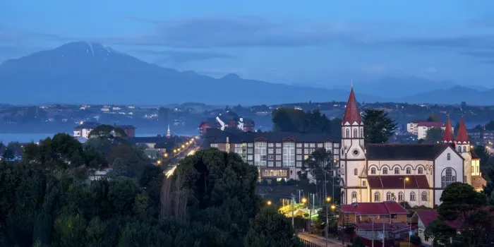 Framed Print : Church and Calbuco Volcano at dusk, Puerto Varas, Llanquihue Province, Los Lagos Region Framed Print : Church and Calbuco Volcano at dusk, Puerto Varas, Llanquihue Province, Los Lagos Region