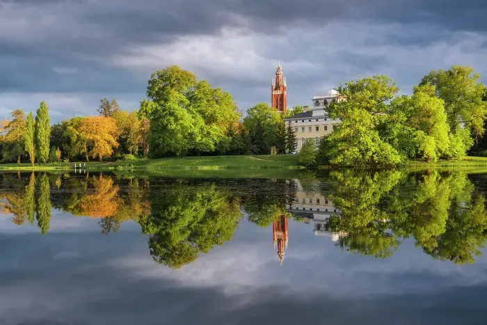 Framed Print : Church, castle and deciduous trees reflected in the lake Worlitz, Dessau-Worlitzer Garden Realm, English style landscape park, Unesco World Heritage site, Dessau-Worlitz, Saxony-Anhalt, Germany