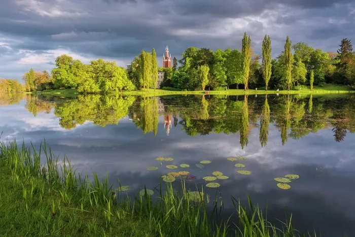 Framed Print : Church and deciduous trees reflected in the lake Worlitz Dessau-Worlitzer Garden Realm, English style landscape park, Unesco World Heritage site, Dessau-Worlitz, Saxony-Anhalt, Germany Framed Print : Church and deciduous trees reflected in the lake Worlitz Dessau-Worlitzer Garden Realm, English style landscape park, Unesco World Heritage site, Dessau-Worlitz, Saxony-Anhalt, Germany