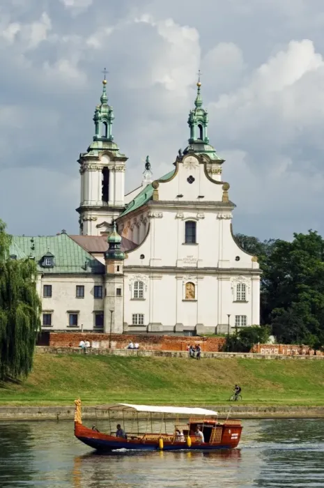 Framed Print : Church overlooking Boat on Vistula River, Krakow, Poland Framed Print : Church overlooking Boat on Vistula River, Krakow, Poland