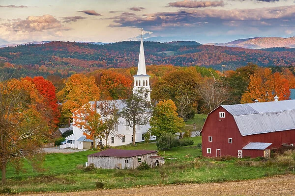 Church and red barn, Peacham, Vermont, USA