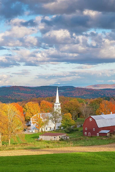 Church and red barn, Peacham, Vermont, USA