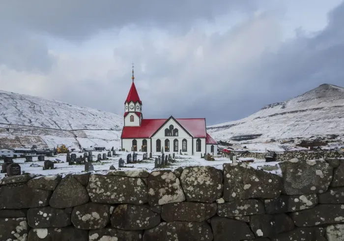 Framed Print : The church in Sandavagur covered by snow. Vagar, Faroe Islands