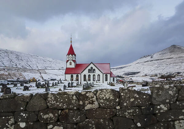 The church in Sandavagur covered by snow. Vagar, Faroe Islands