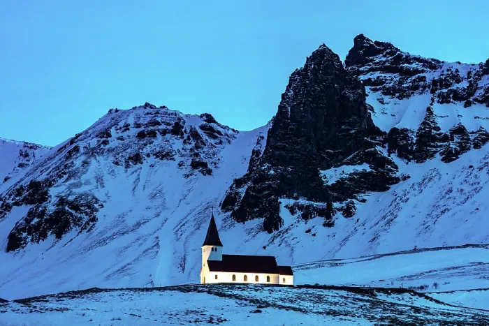 Framed Print : Church with snow-covered mountains in the background at dusk, Vik y Myrdal, South Iceland Framed Print : Church with snow-covered mountains in the background at dusk, Vik y Myrdal, South Iceland