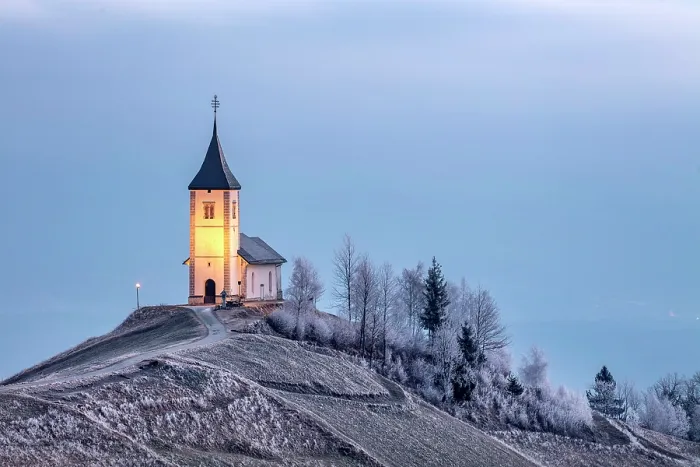 Framed Print : Church of St. Primoz and Felician in winter, Jamnik, Slovenia