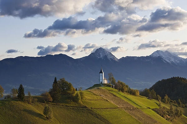Church of St. Primoz with the Kamnik-Savinja Alps beyond, Gorenjska, Slovenia