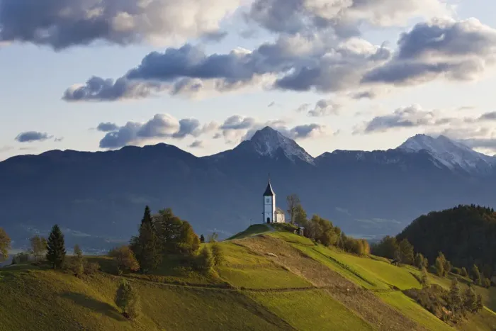 Framed Print : Church of St. Primoz with the Kamnik-Savinja Alps beyond, Gorenjska, Slovenia Framed Print : Church of St. Primoz with the Kamnik-Savinja Alps beyond, Gorenjska, Slovenia