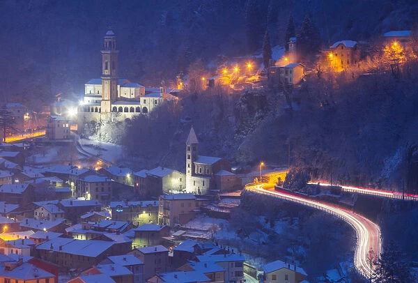 Churches at night. Sondalo, Sondrio district, Valtellina, Lombardy, Italy