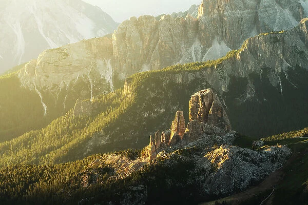 The Cinque Torri taking the first light of the day, seen from the elevated perspective of the Lagazuoi hut. Dolomites, Italy