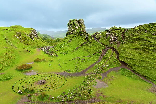 Circular rock pattern on green landscape near Castle Ewen, Fairy Glen, Isle of Skye, Highland Region, Scotland, United Kingdom