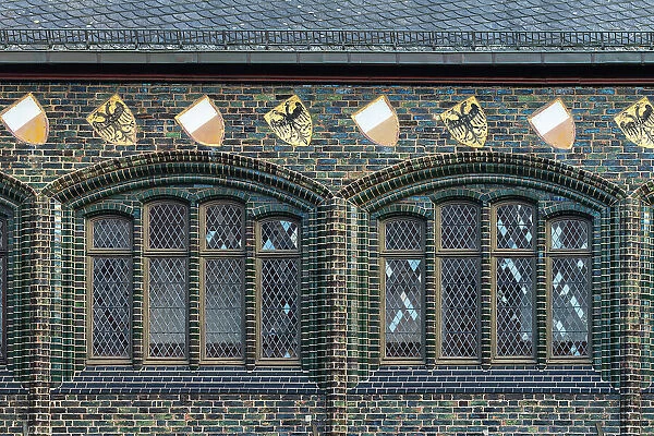 Detail on City Hall of Lubeck, coats of arms and windows, Lubeck, UNESCO, Schleswig-Holstein, Germany