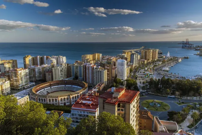 Framed Print : City skyline with La Malagueta bullring at sunset, Malaga, Andalusia, Spain