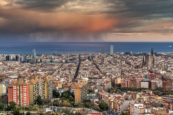 City skyline with stormy sky at sunset, Barcelona, Catalonia, Spain