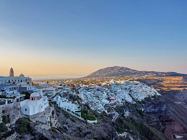 Cityscape of Fira at sunrise, Santorini or Thira Island, Cyclades, Greece