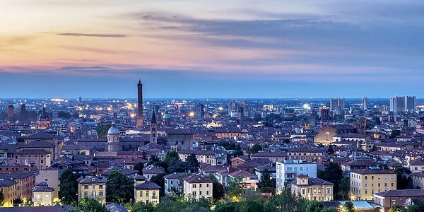 Cityscape with San Domenico Basilica and Asinelli Tower at dusk, elevated view, Bologna