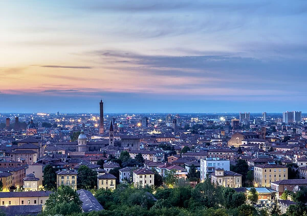 Cityscape with San Domenico Basilica and Asinelli Tower at dusk, elevated view, Bologna